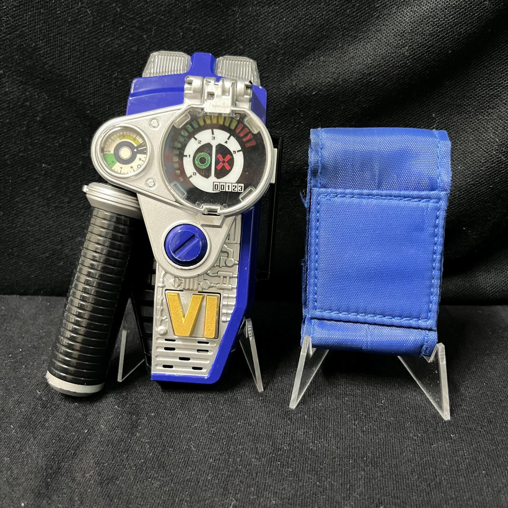 Collection of morphers and licenses from Power Rangers S.P.D. and Super Sentai Dekaranger: Delta Morphers, Red Ranger Morpher, SPD License, Dekamaster License, Patrol Morpher, and Morpher SPD.