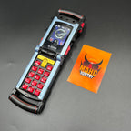 Go-onger Go-on Gear and RPM Morpher, wrist morphers from the Japanese and American series Engine Sentai Go-onger (2008) and Power Rangers RPM (2009).