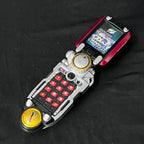 GoGo Sentai Boukenger (2006) Overdrive Tracker Changer, a collectible wrist and handheld morphing device adapted as Power Rangers Operation Overdrive Morpher (2007).