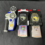 Transformation devices from Power Rangers S.P.D. and Dekaranger including Delta Morphers, Red Ranger Morpher, SPD Licenses, Dekamaster License, Patrol Morpher, and Morpher SPD.