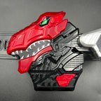 May include: A silver and gold dinosaur-shaped toy with a red mouth and yellow accents. Two silver knight figurines with gold weapons and shields are also present. The shields have black and orange designs. The toy appears to be a Power Rangers or similar action figure.