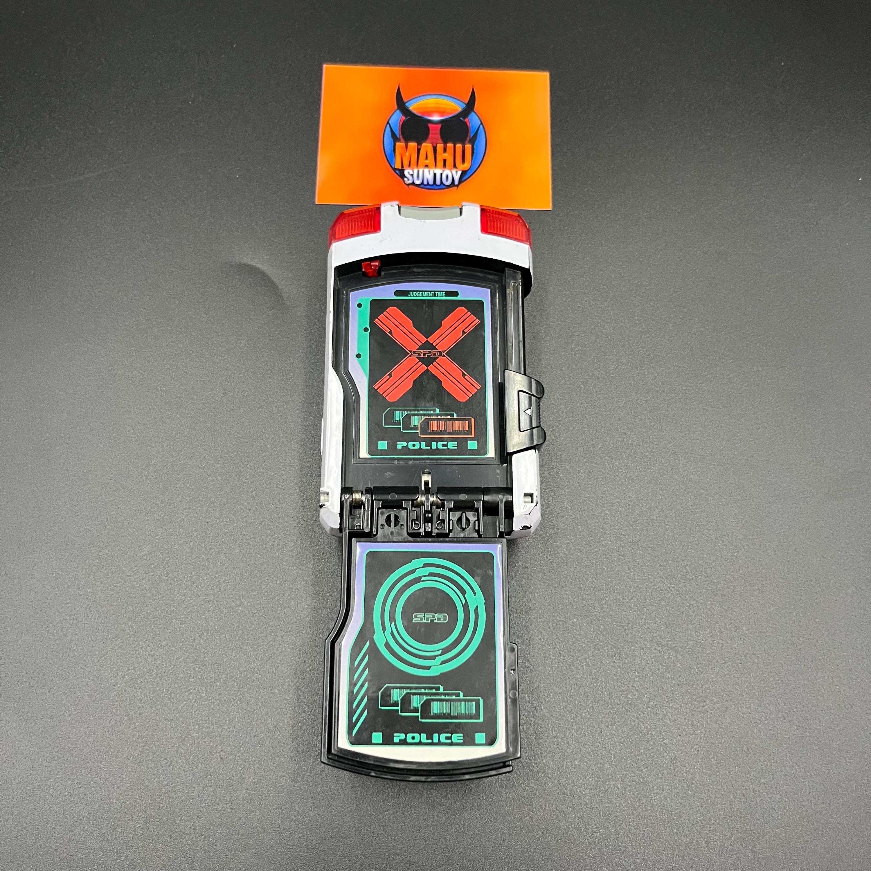 Power Rangers S.P.D. and Dekaranger gear collection: Delta Morphers, Red Ranger Morpher, SPD Licenses, Dekamaster License, and Morpher SPD.